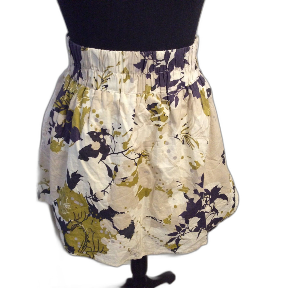 NWOT Francesca's Criss Cross Floral A Line skirt with Side Pockets Size S Lined